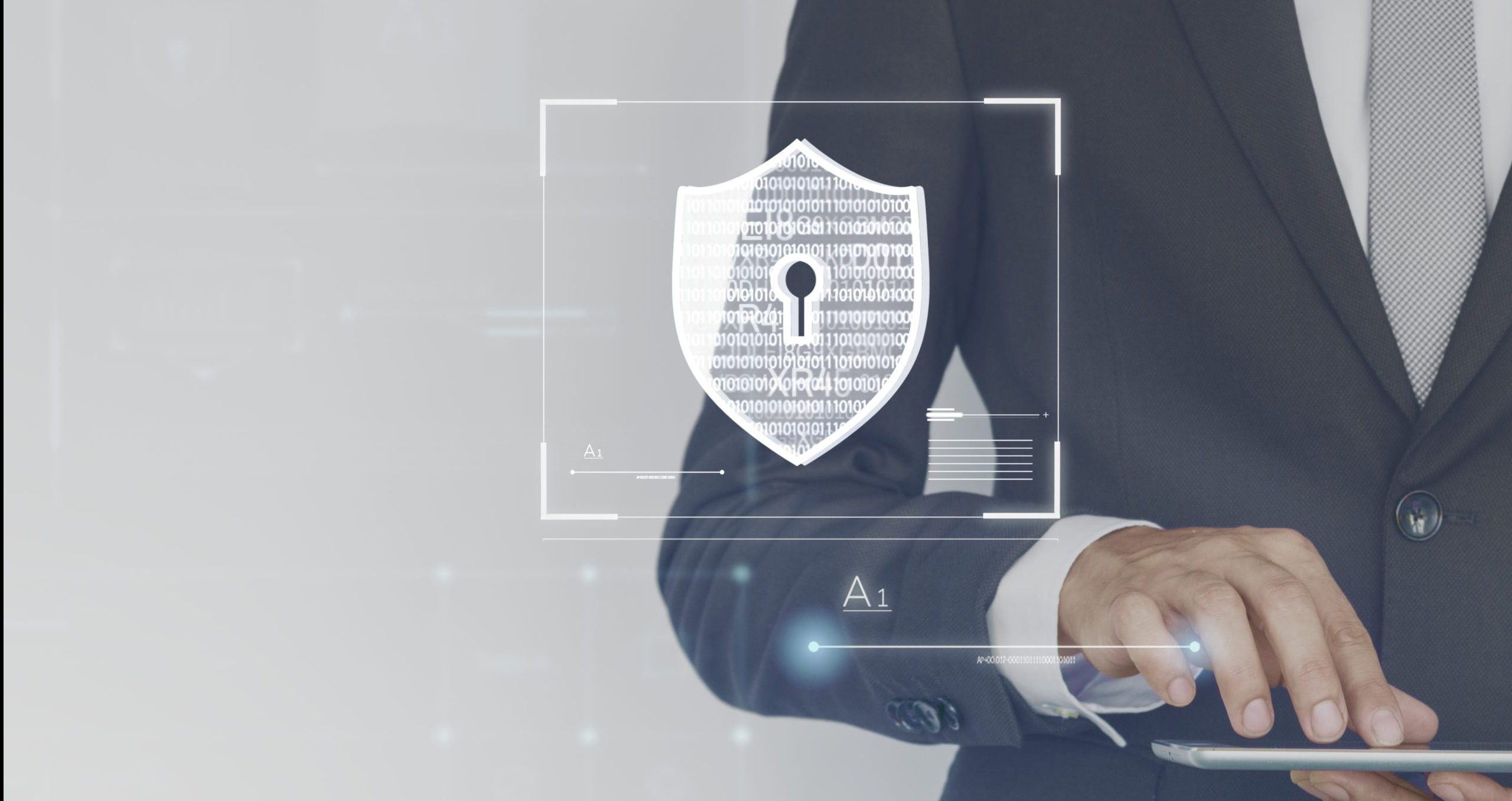 Businessman logging in to his tablet